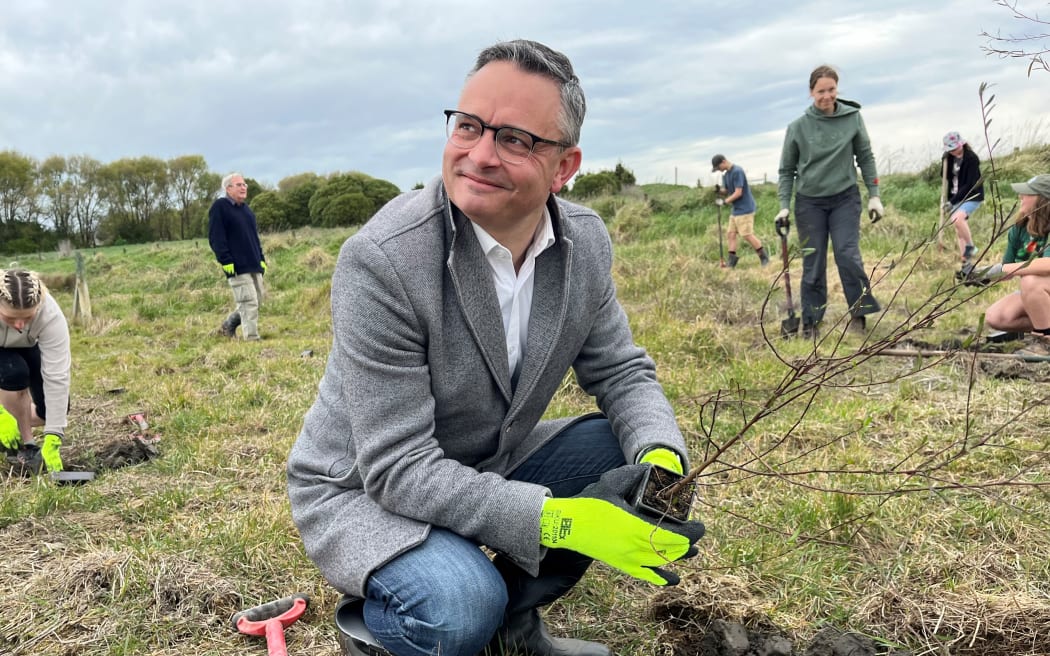 Greens co-leader James Shaw at a tree planting event with Forest & Bird at Christchurch's Bexley Park.