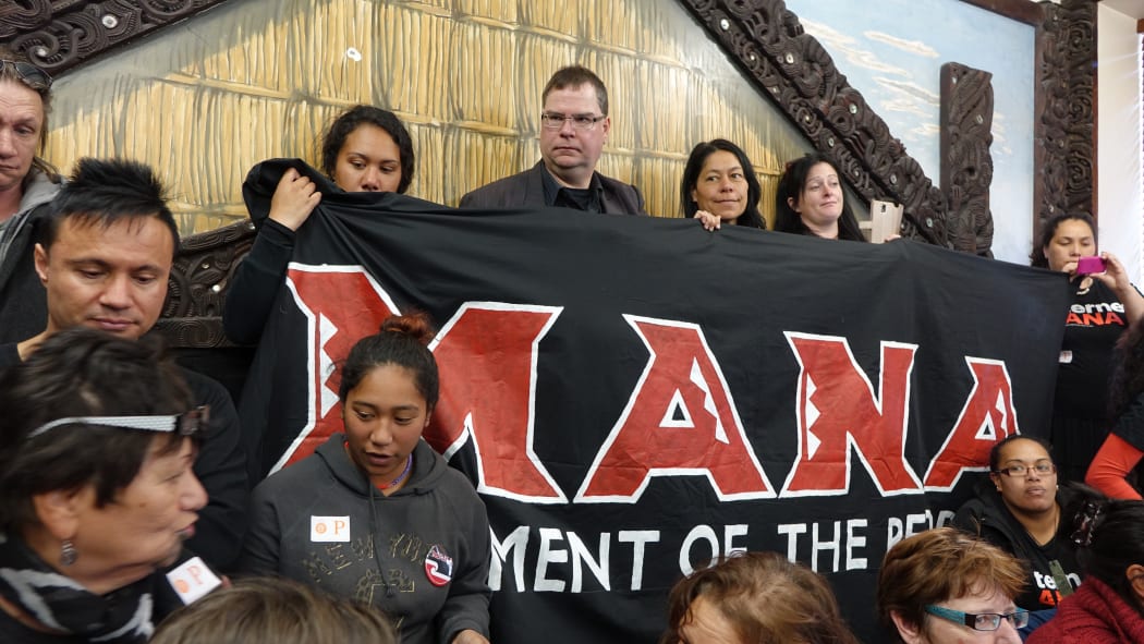 Mana Movement leader Hone Harawira is farewelled by supporters at Parliament.