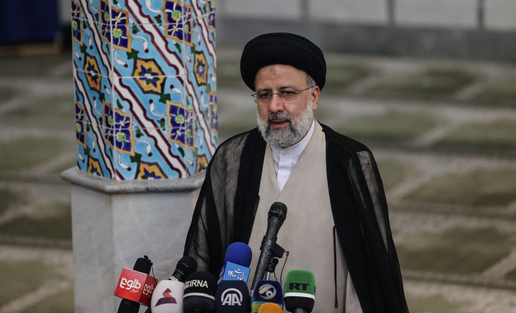 Ebrahim Raisi gives a news conference after voting in the presidential election, at a polling station in the capital Tehran, on June 18, 2021.