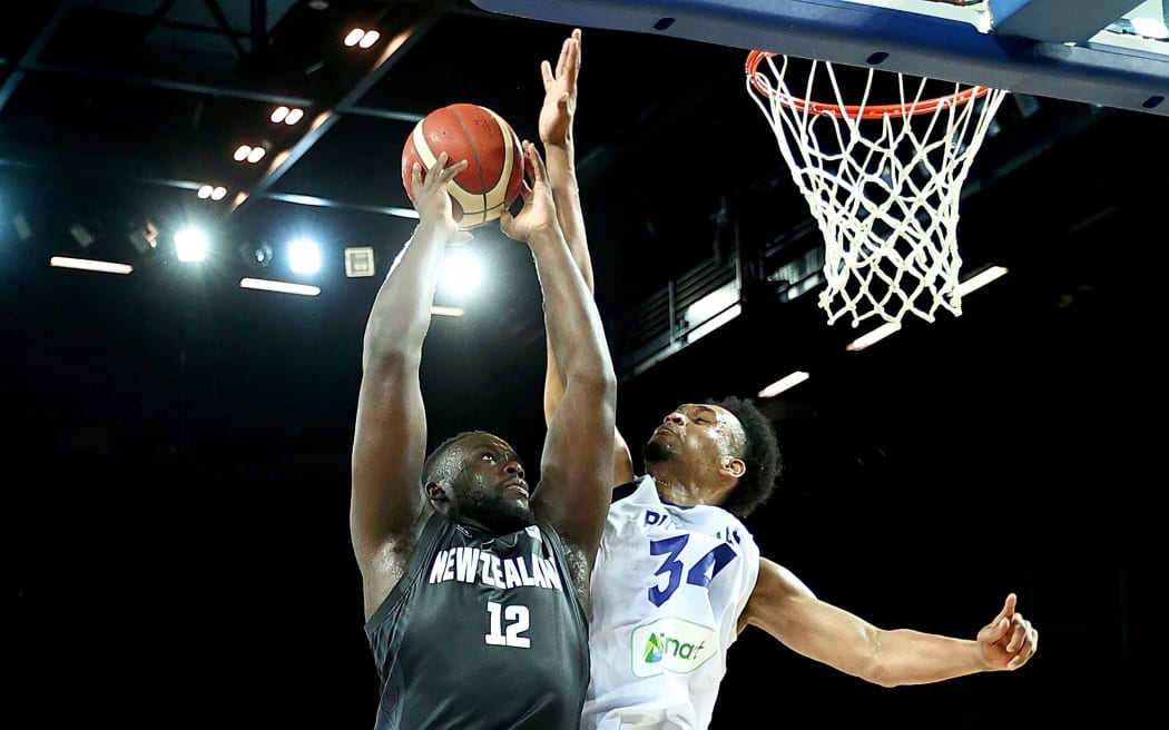 Max Darling of New Zealand shoots against the Philippines.