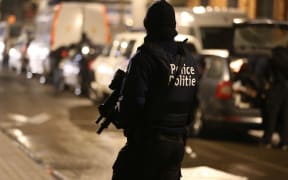 Police on patrol after dozens were killed in the Brussels bombings