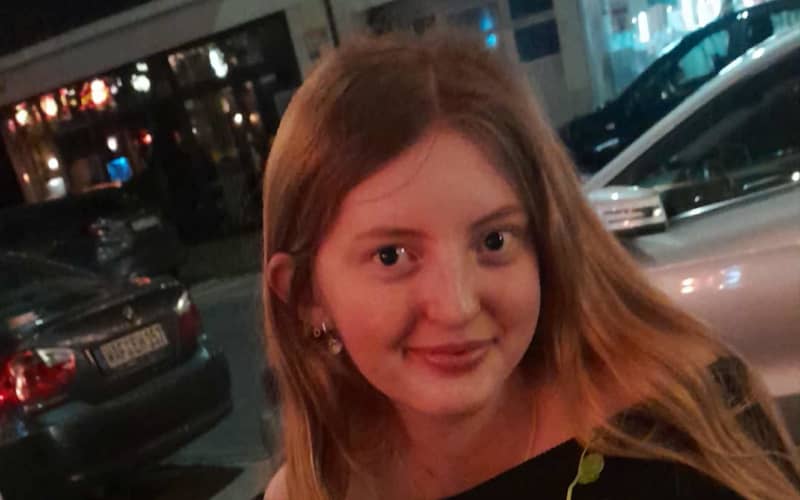 Amelia eating sushi in Germany after surgery.