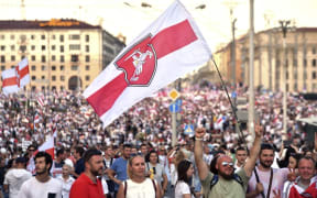Belarus opposition supporters attend a demonstration in central Minsk on August 16, 2020.