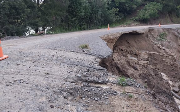 Damage on Waihau Road, where it is acting as a dam against a small lake in Dartmoor near Napier.
