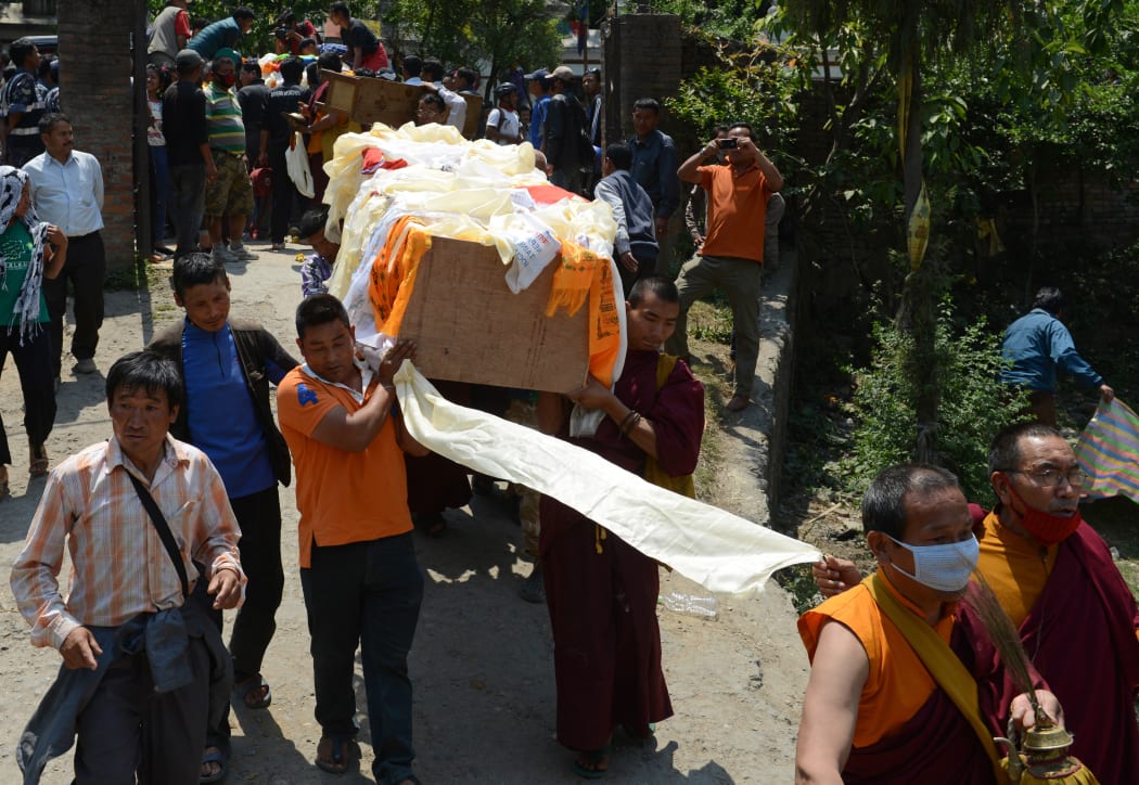 Thirteen guides died and three are missing.