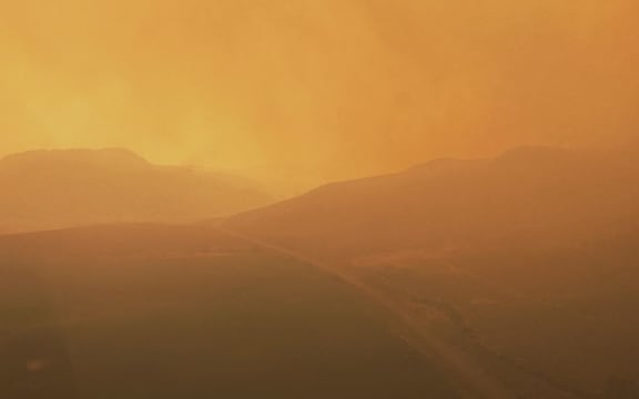 The "apocalyptic twilight" conditions firefighters are working in in British Colombia.