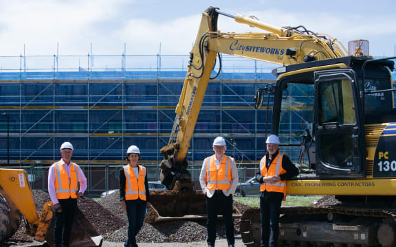 Simplicity Living directors (from left) Shane Brealey, Anna Brealey, Sam Stubbs, and Andrew Lance on site at the Hinaki Street development.