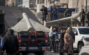 Iranian-made unmanned aerial vehicles (UAV), the Shahed-136, are pictured during a military rally in downtown Tehran, Iran, on January 10, 2025. The IRGC spokesperson says on Monday, January 6, that the military rally named Rahian-e-Quds (Passengers of Al-Aqsa) includes 110,000 IRGC members. (Photo by Morteza Nikoubazl/NurPhoto) (Photo by Morteza Nikoubazl / NurPhoto via AFP)