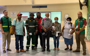 A team with personnel from Papua New Guinea's Department of Health, St John's Ambulance and other agencies, with support from the WHO and UNICEF, flew to East New Britain, 7 April 2020, following confirmation of a covid--19 case in Kokopo.
