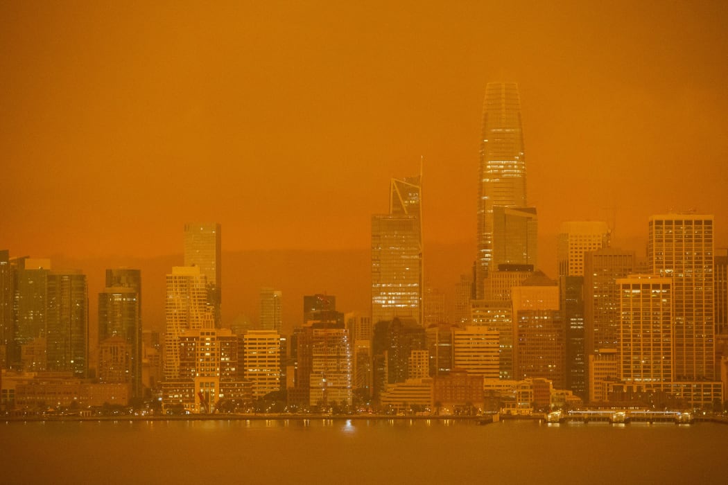 The San Francisco skyline is obscured in orange smoke and haze as their seen from Treasure Island in San Francisco, California on 9 September, 2020.