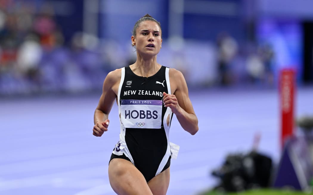 Zoe Hobbs running in the 100m sprint.