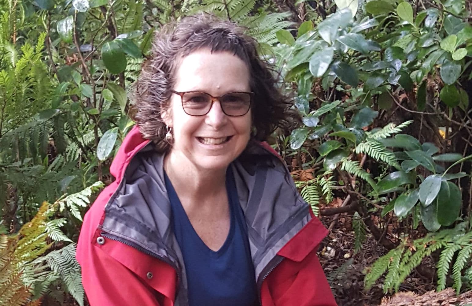 Our Changing World producer Alison Ballance helping check stoats traps in Fiordland.