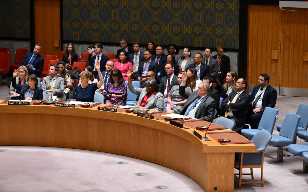 United Nations Security Council members vote during a meeting on the situation in the Middle East at UN headquarters on June 10, 2024 in New York. The United Nations Security Council on Monday adopted a US-drafted resolution supporting a ceasefire plan in Gaza, as Washington leads an intense diplomatic campaign to push Hamas to accept the proposal. The text -- passed with 14 votes in favor and Russia abstaining -- "welcomes" the truce and hostage release proposal announced on May 31 by President Joe Biden, and urges "parties to fully implement its terms without delay and without condition." (Photo by ANGELA WEISS / AFP)