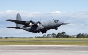 A Hercules C130 H is loaded up with HADR supplies to deliver to Vanuatu after a severe earthquake.