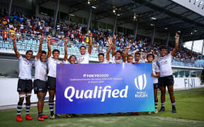 The Fiji women's sevens team celebrate qualifying for the Tokyo 2020 Olympics.