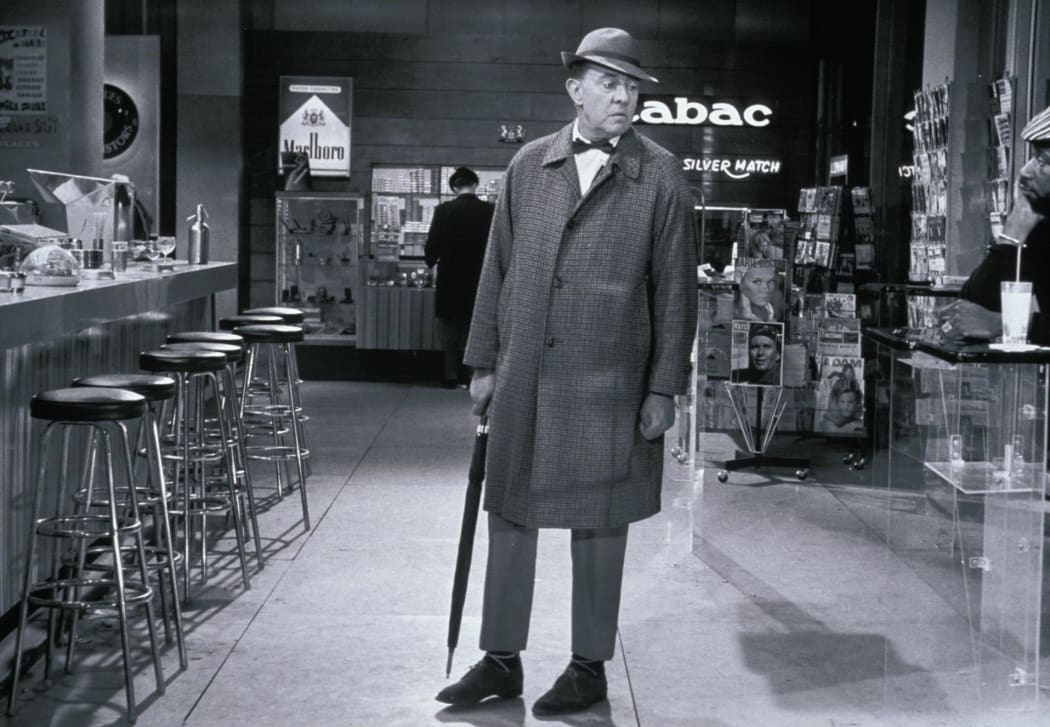 Tati on the set of Playtime in his M. Hulot costume.