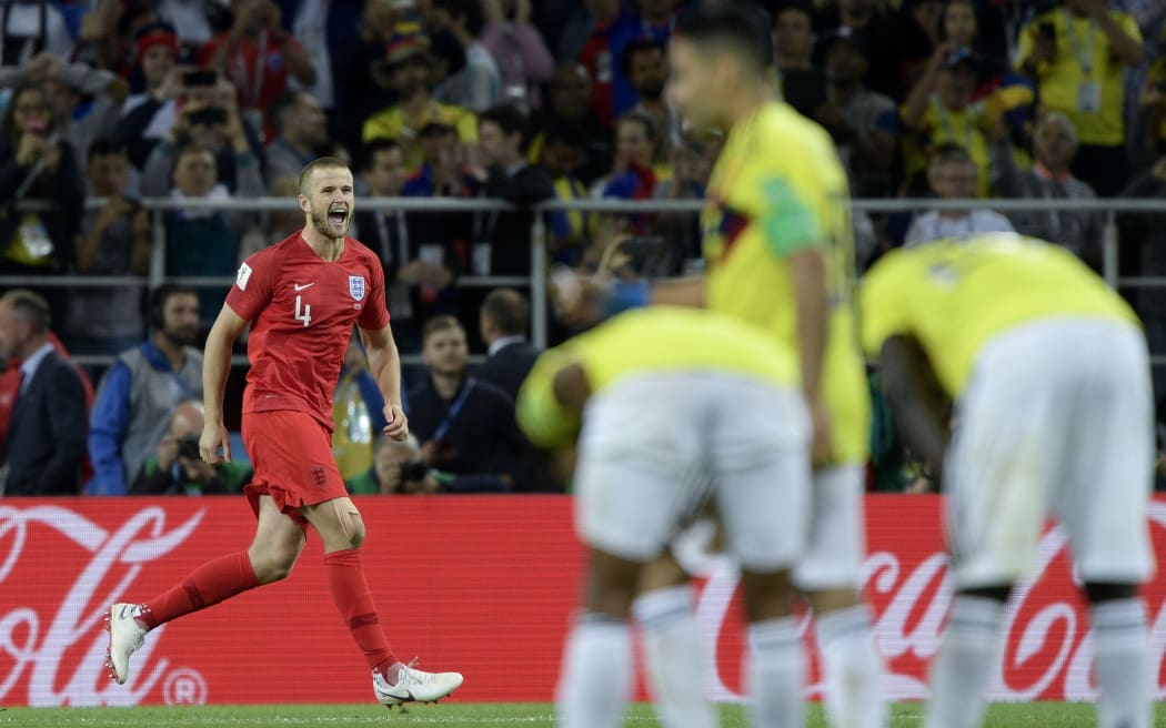 England's midfielder Eric Dier celebrates scoring during the penalty shootout against Colombia.