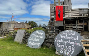 Structures set up at Ihumātao.