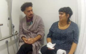 James Nokise and Angela Dravid share a moment in Eating Fried Chicken in the Shower.