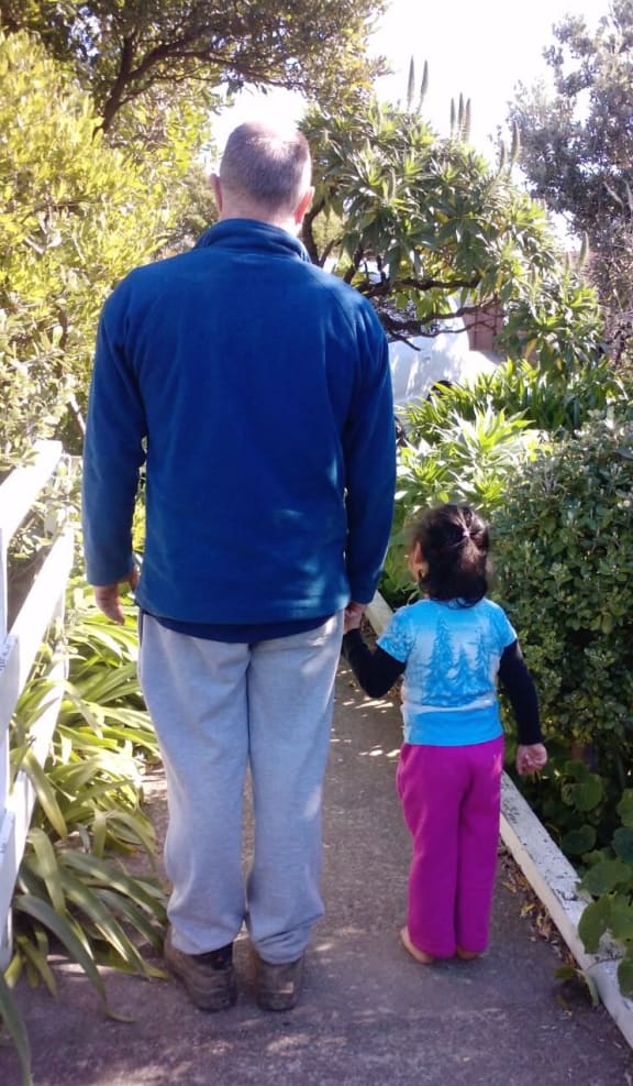 Child and parent in a permanency placement.