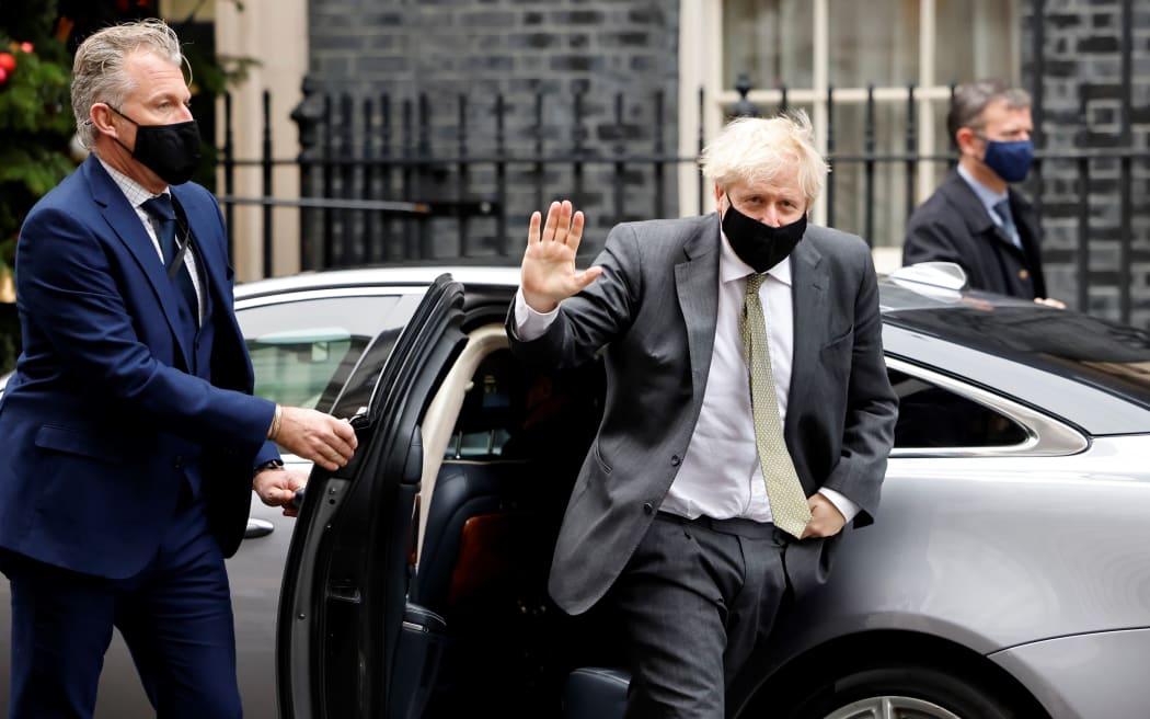 Britain's Prime Minister Boris Johnson returns to 10 Downing Street after Prime Minister's Questions at the House of Commons.