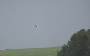 A plane struggles to land at Leeds Bradford Airport as Storm Floris sweeps over the UK, mostly hitting Scotland and northern England.