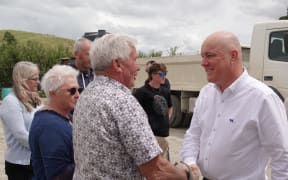 Danny Bearsley  talks to Prime Minister Christopher Luxon on 11 February 2024.