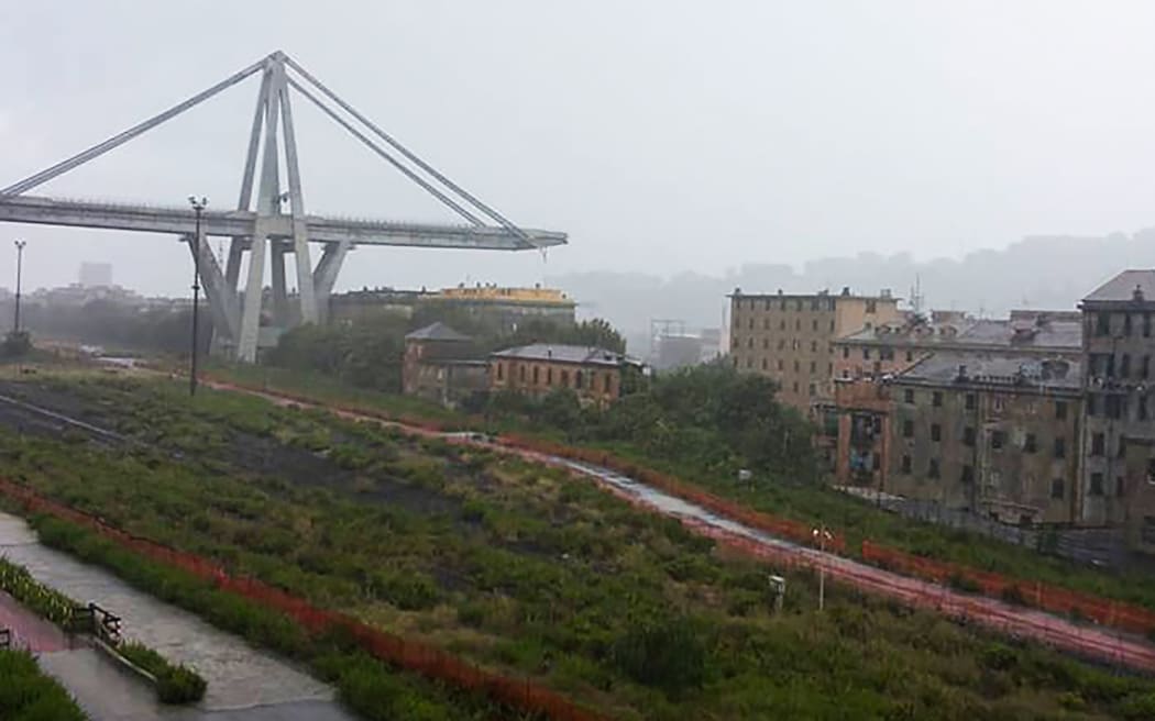 A handout picture from the Facebook account of Paola Pirrera shows a collapsed section of a viaduct on the A10 motorway in Genoa.