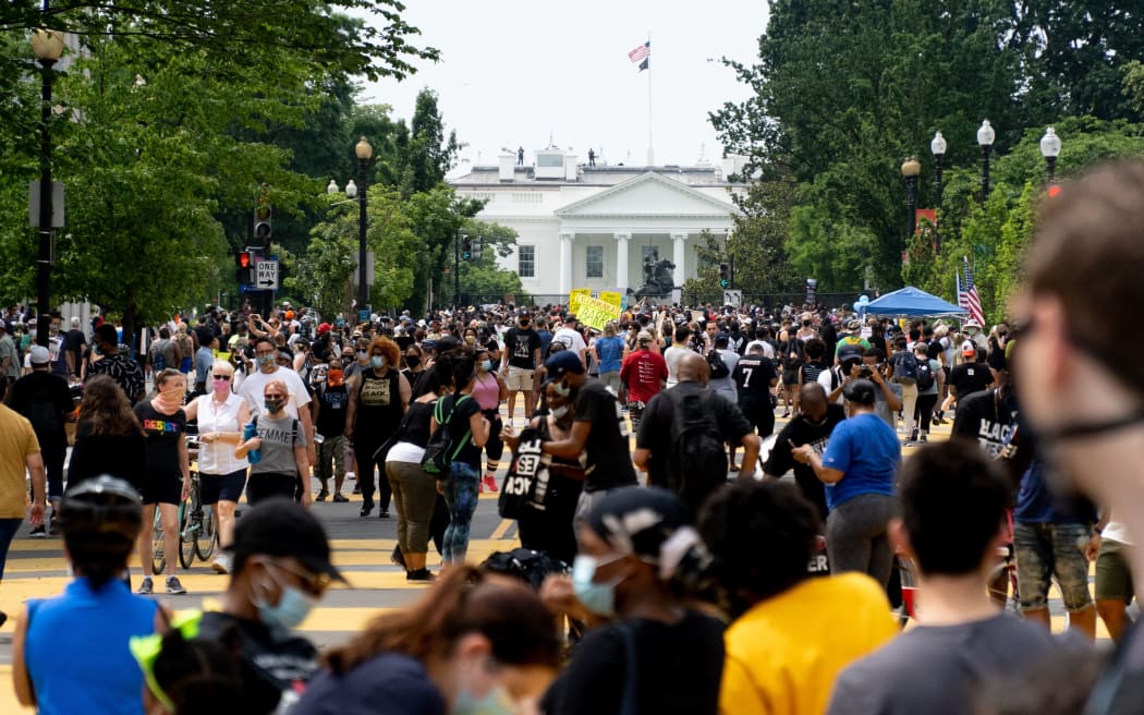 Protestors gather along 16th St north of the White House, speaking out against systemic inequality and police brutality, June 6, 2020.