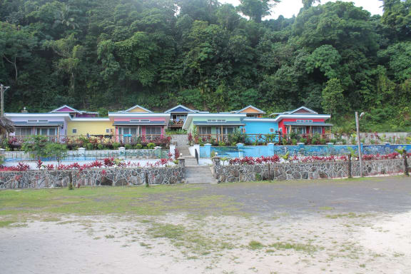 Taufua Beach Fales new "psychedelic" accommodation beyond the tsunami and inundation zone.