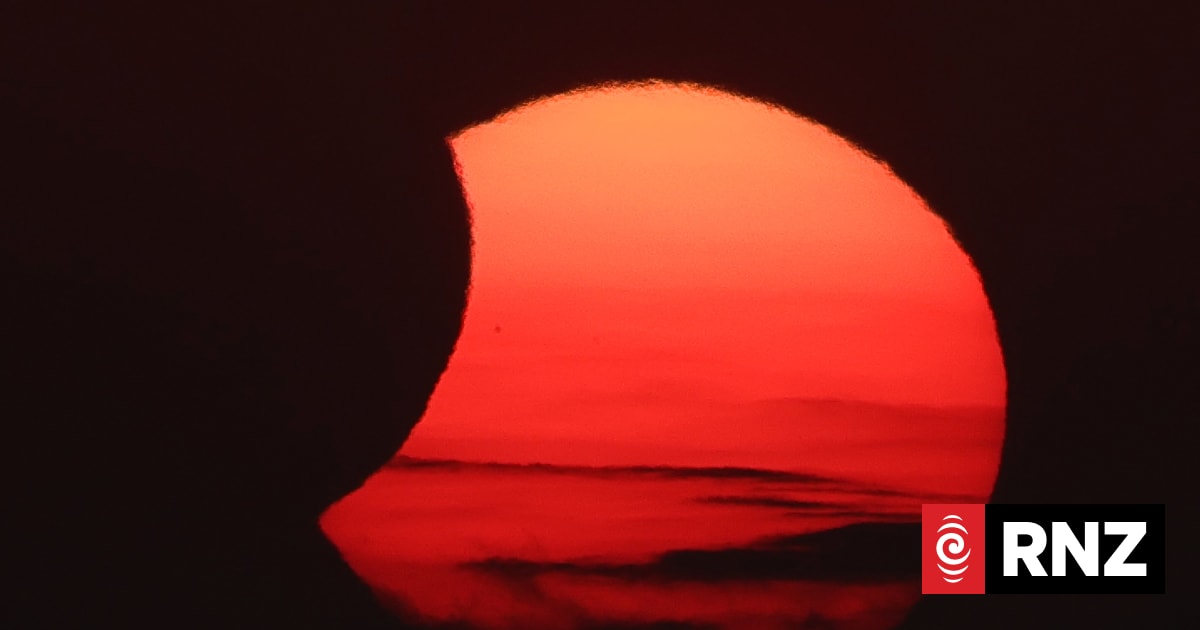 The Moon uncovers the Sun in the moments following totality of the solar eclipse as seen from La Zurriola beach in San