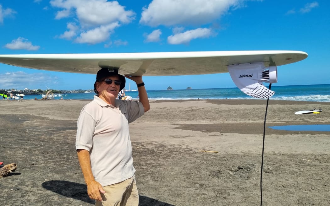 Allen Pidwell with his motorized surfboard.