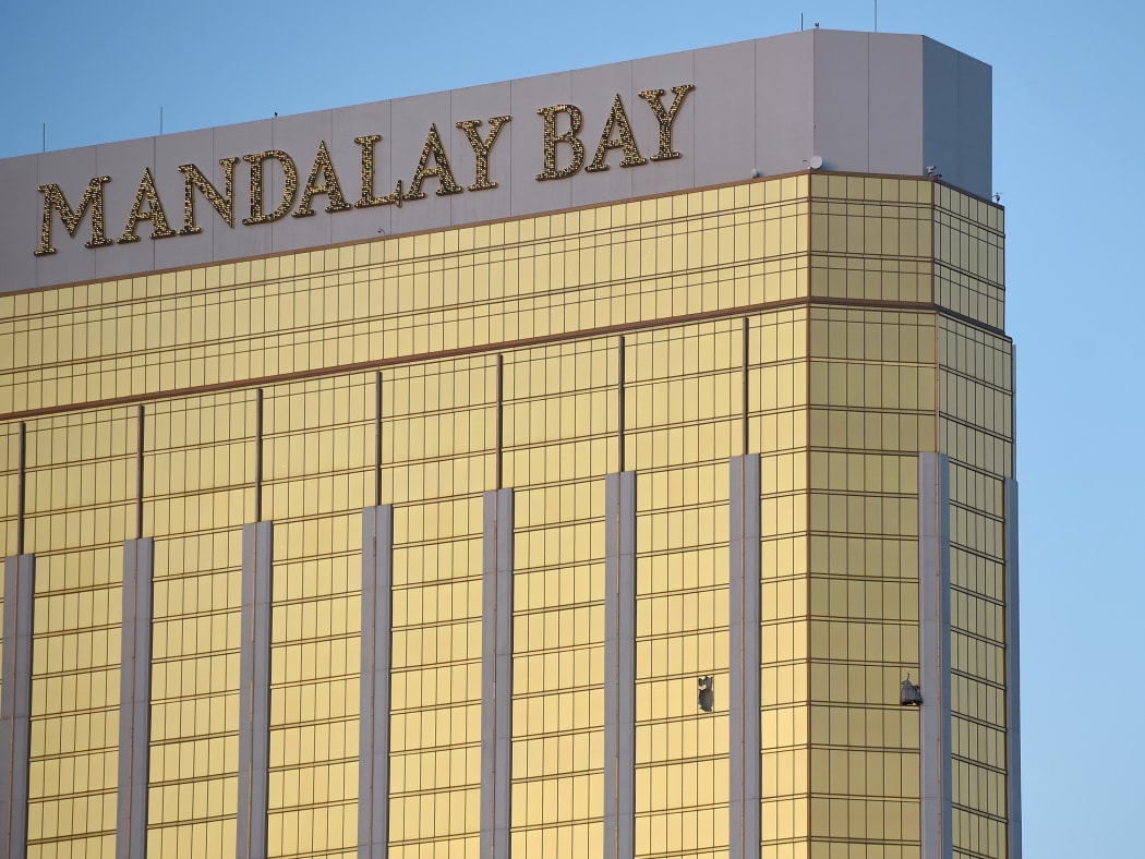 Broken windows on the 32nd floor of the Mandalay Bay Resort and Casino.