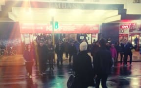 Crowds of film buffs brave the wet, Wellington weather.