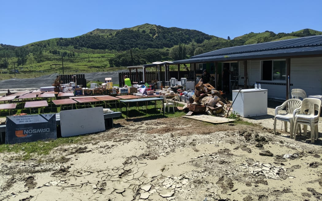 At Pukatewai Marae, Tolaga Bay, generations of whanau came together with mops and buckets to clean the silt and water from inside.