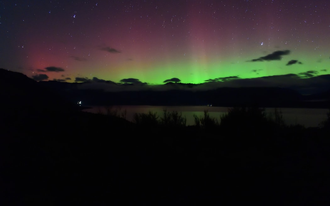 The Southern Lights seen from Bennetts Bluff lookout between Queenstown and Glenorchy, just after 3am on 20 April, 2024.