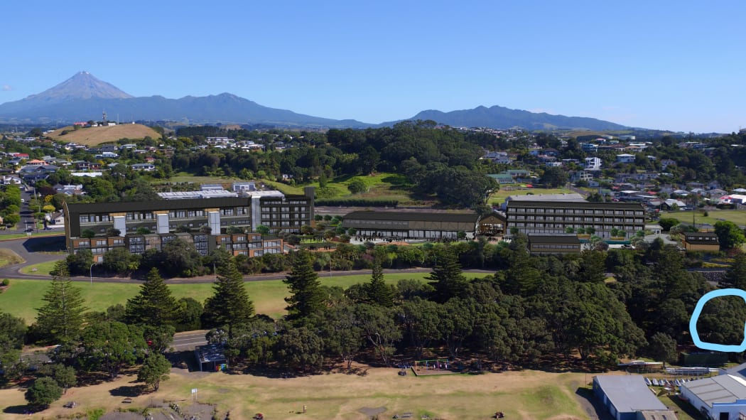 Artists impression of a proposed development near Ngāmotu Beach in New Plymouth. Circled at right is an operating oil well.