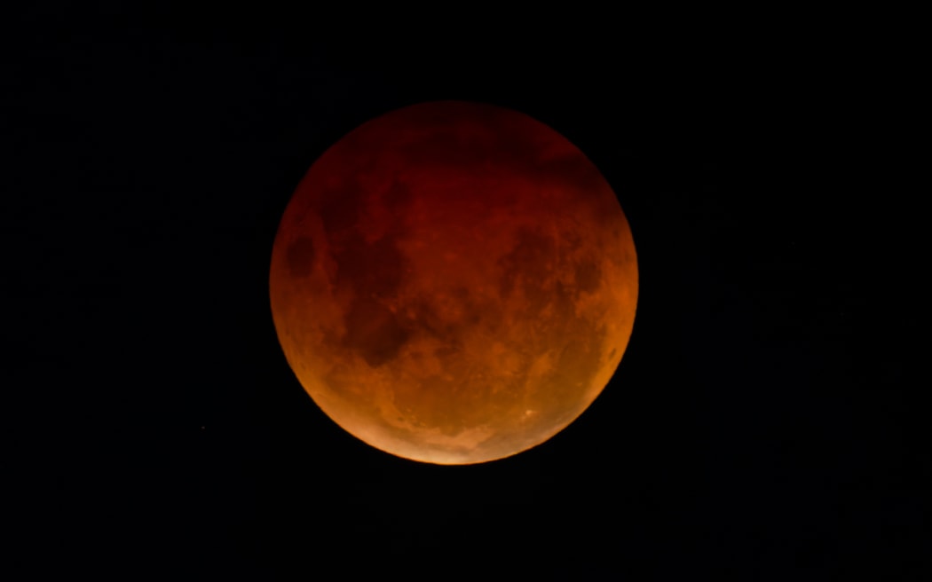 Michael Sanders captured this photo of the blood moon lunar eclipse from Cockle Bay in Howick, Auckland, on Friday 14 March, 2025.