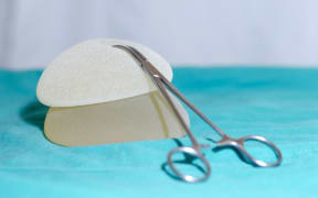 The rate of cancer linked to breast implants is higher than initially thought.