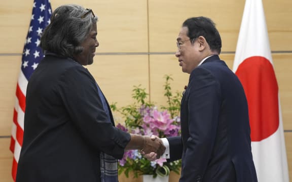 US Ambassador to the UN Linda Thomas-Greenfield (L) and Japan's Prime Minister Fumio Kishida shake hands during a meeting at the prime minister's office in Tokyo on April 19, 2024. (Photo by Eugene Hoshiko / POOL / AFP)