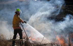 New Zealand Defence Force firefighters combat the Richmond fire near Nelson.