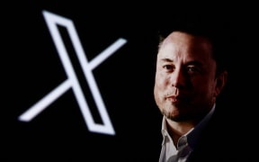 A portrait picture of Elon Musk photographed in Krakow, Poland on January 22nd, 2024 and X, former Twitter, logo are screened for illustration photo in Krakow, Poland on October 25, 2024. (Photo by Beata Zawrzel/NurPhoto) (Photo by Beata Zawrzel / NurPhoto / NurPhoto via AFP)