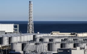 Storage tanks for contaminated water at the Tokyo Electric Power Company's (TEPCO) Fukushima Daiichi nuclear power plant, in Okuma of Fukushima prefecture in Jan. 20, 2023. [Philip Fong / AFP]