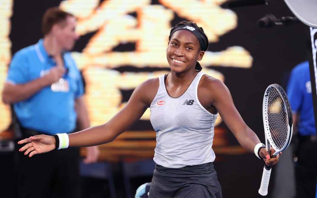 Coco Gauff of the US celebrates after victory against Japan's Naomi Osaka during their women's singles match on day five of the Australian Open tennis tournament in Melbourne on January 24, 2020.