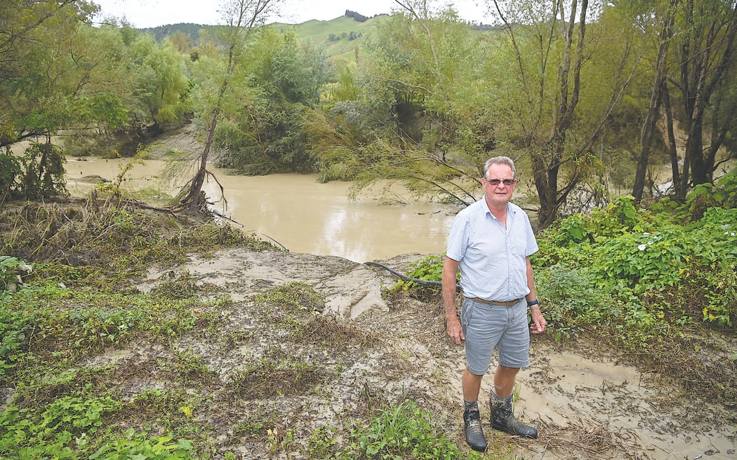 Opou Station’s David Clark in front of Te Arai River, which frequently floods in severe weather. Clark says if a management plan for the catchment is not put in place with urgency, “millions of dollars” in crops could be lost in future rain events.