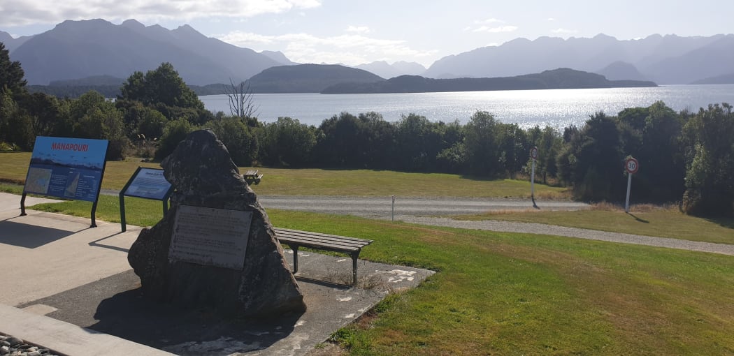 A large rock near Lake Manapouri serves as a tribute to the campaign to protect it, and marks where the water would have risen to if a proposal had gone ahead.