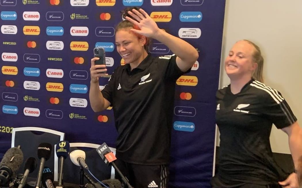 Ruby Tui engaging reporters at a Rugby World Cup press conference.