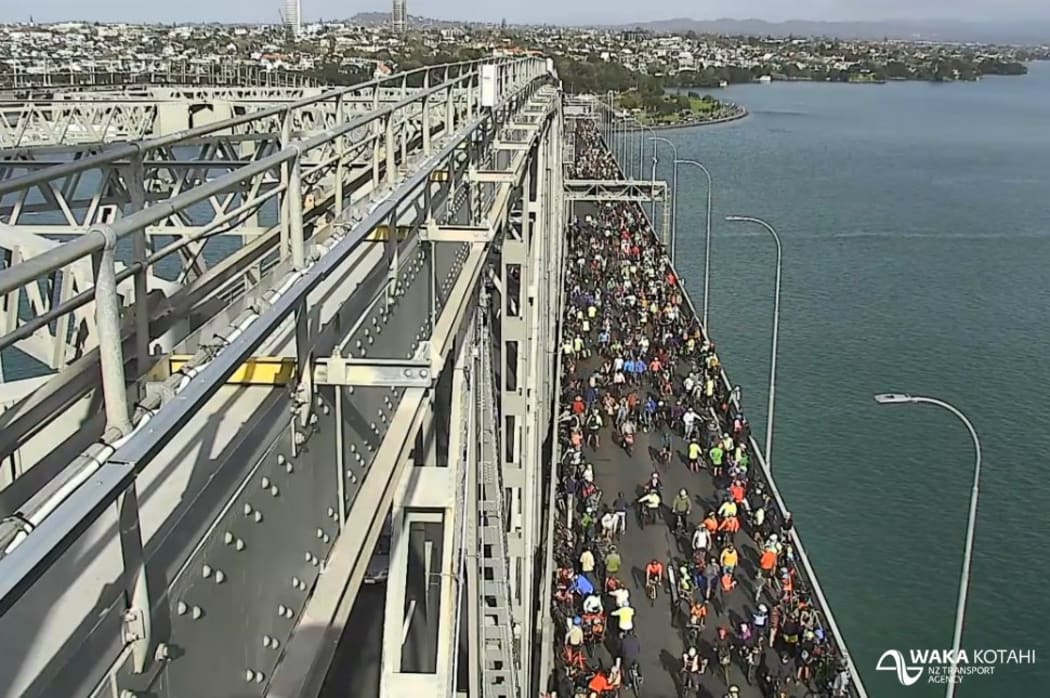 The cyclists on the bridge