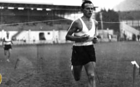 Arch Jelley winning the one mile Ness Cup at Carisbrook in 1946. The race was held during half-time at the rugby.