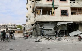 Heavily damaged buildings are seen in this file photo of Misraba.